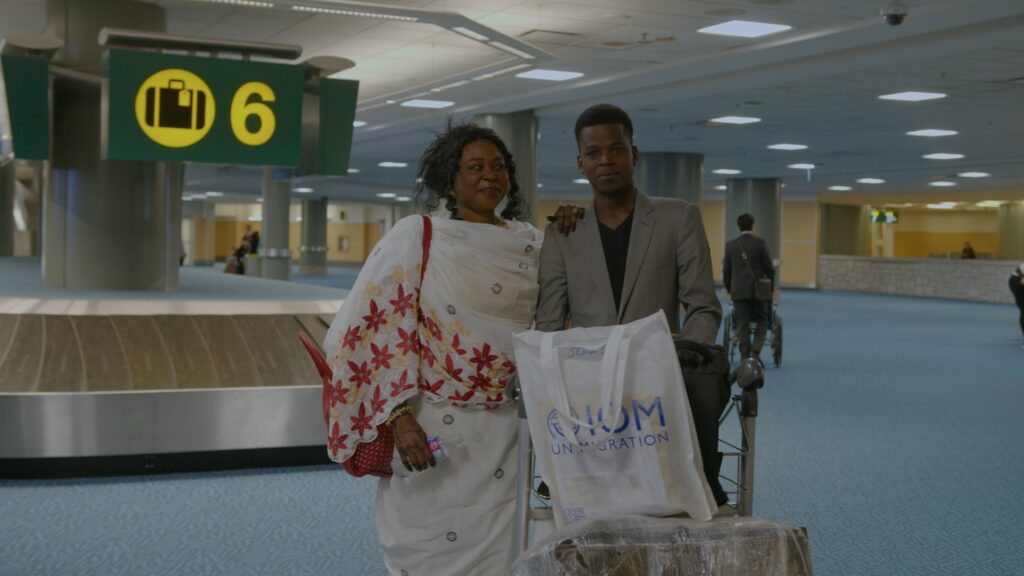 Black couple at the airport baggage claim