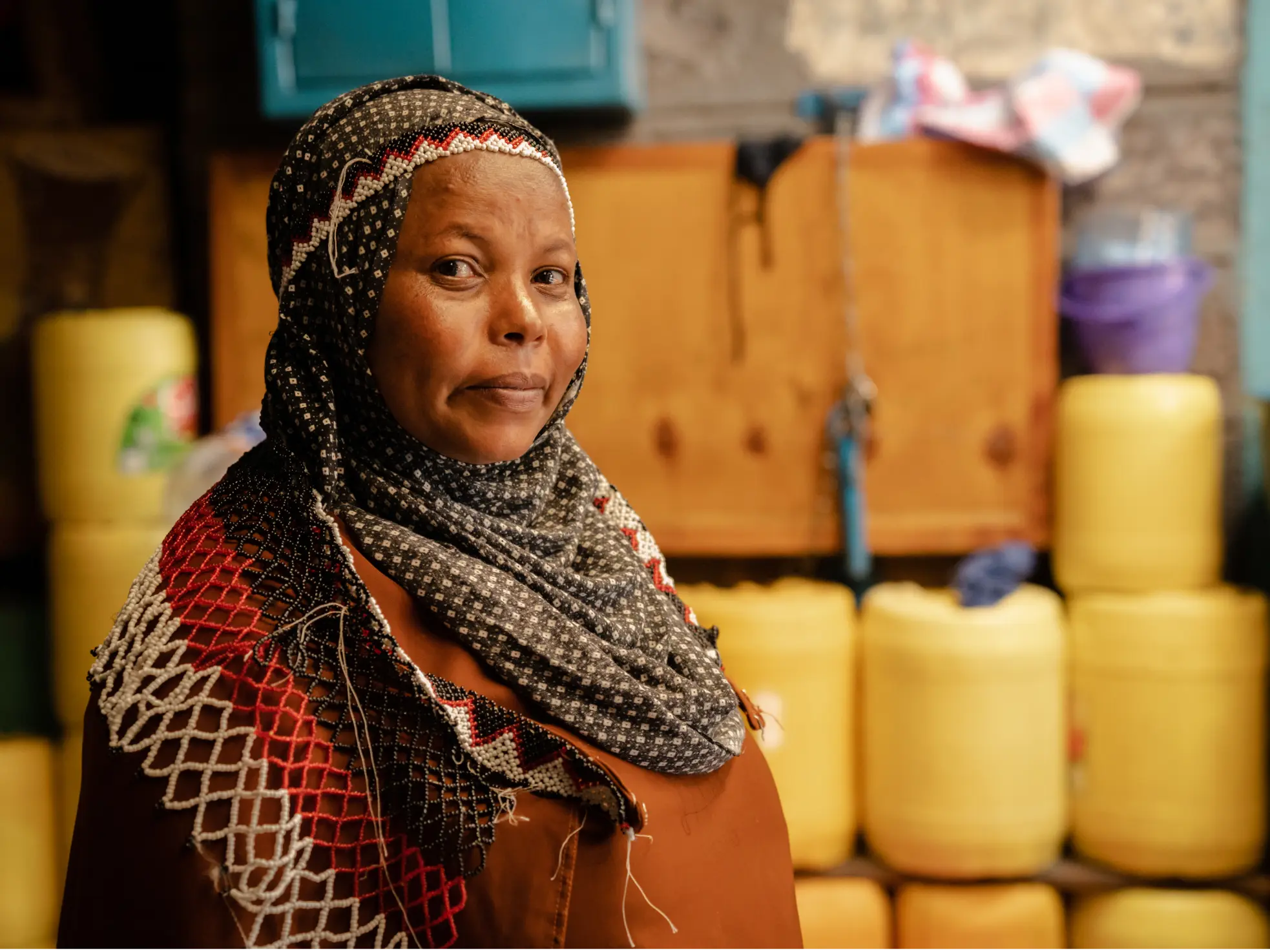 woman outside in front of supplies