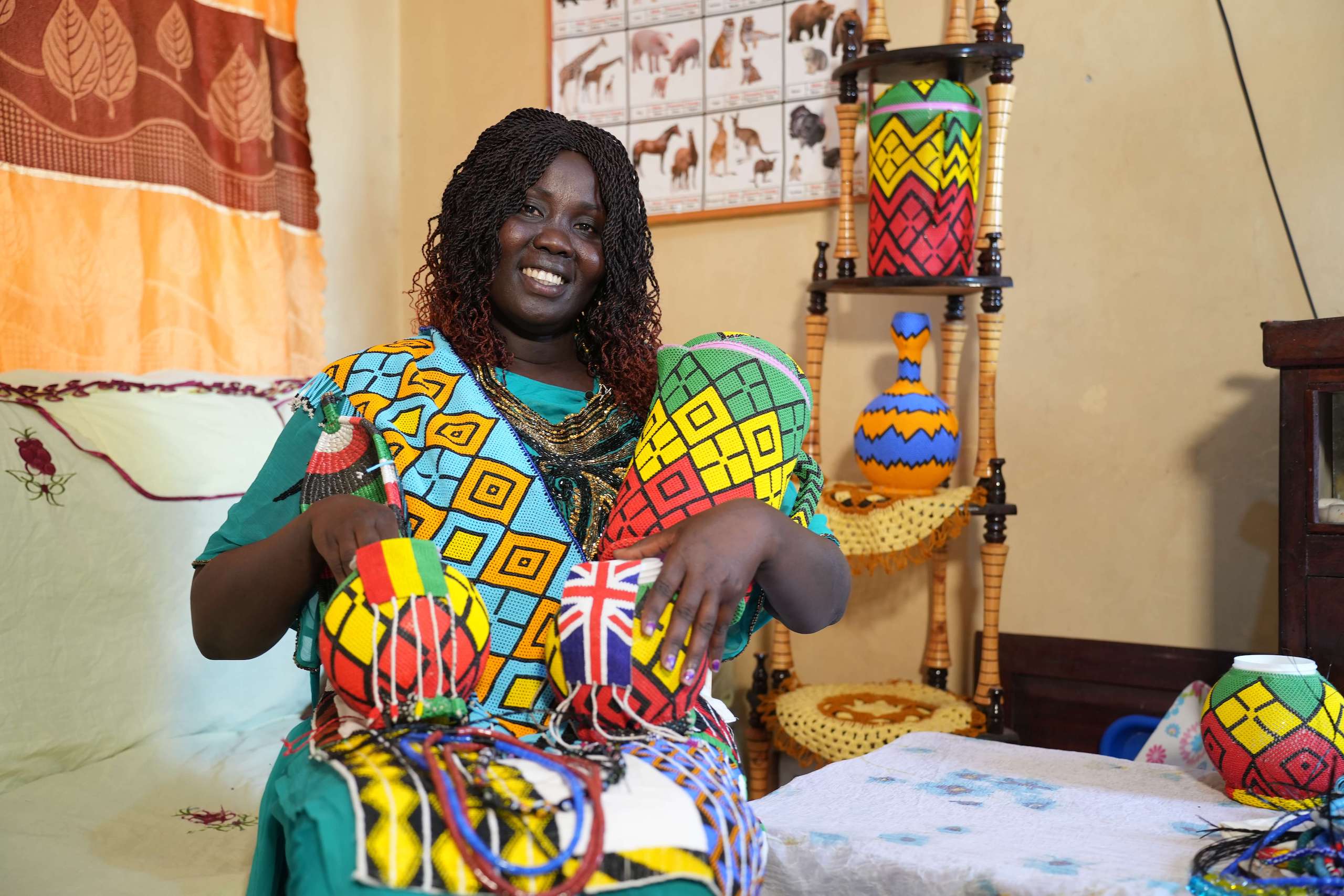 woman holding several textiles